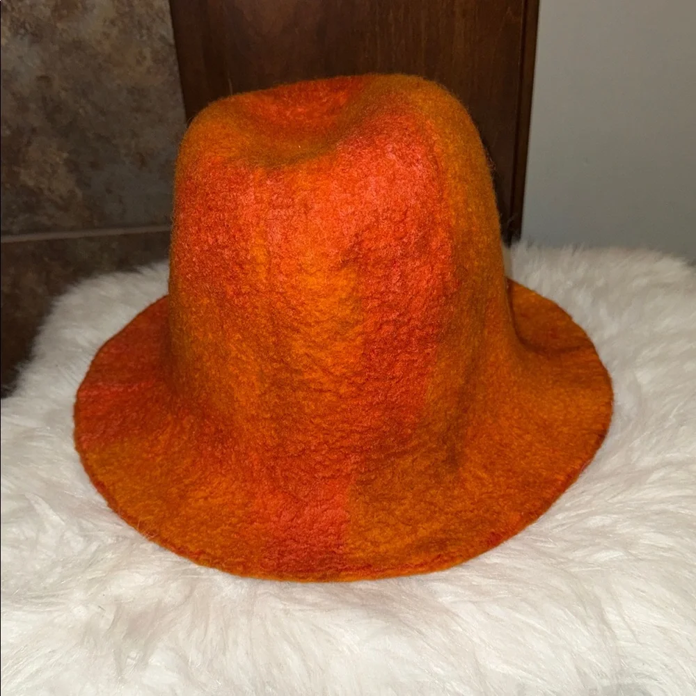 Camilla Krueger Designs orange marbled artisan hand-felted wool sculptural hat